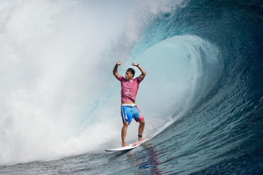 Kauli Vaast, of France, celebrates during the gold medal match of the surfing competition at the 2024 Summer Olympics, Monday, Aug. 5, 2024, in Teahupo'o, Tahiti. (AP Photo/Gregory Bull)