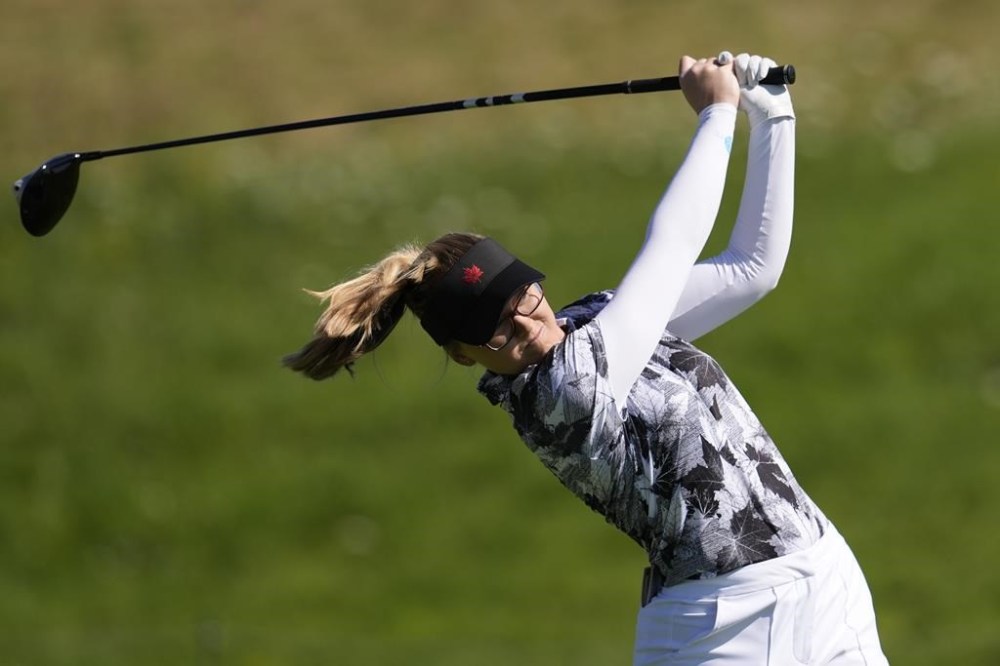Canada's Brooke Henderson hits from the third tee during a practice round of the women's golf event at the 2024 Summer Olympics, at Le Golf National in Saint-Quentin-en-Yvelines, France, Monday, Aug. 5, 2024. THE CANADIAN PRESS/AP-George Walker IV