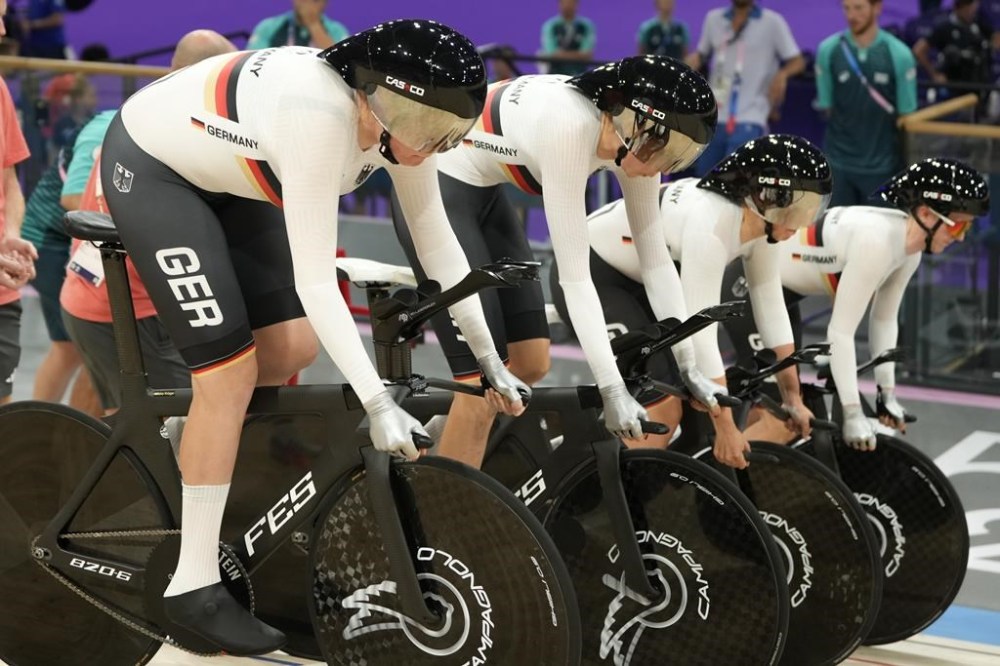 Germany's Franziska Brausse, Laura Suessemilch, Lisa Klein and Mieke Kroeger start the women's team pursuit event, at the 2024 Summer Olympics, Tuesday, Aug. 6, 2024, in Paris, France. (AP Photo/Ricardo Mazalan)