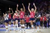 Haleigh Washington, center, and Jordyn Poulter, right, of the United States, celebrate at the end of a women's quarter final volleyball match between the United States and Poland at the 2024 Summer Olympics, Tuesday, Aug. 6, 2024, in Paris, France. (AP Photo/Alessandra Tarantino)