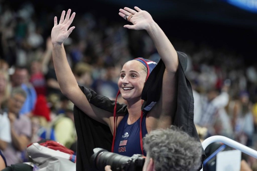 United States' Madeline Musselman celebrates after winning a women's quarterfinal match between USA and Hungary, at the 2024 Summer Olympics, Tuesday, Aug. 6, 2024, in Paris. (AP Photo/Luca Bruno)