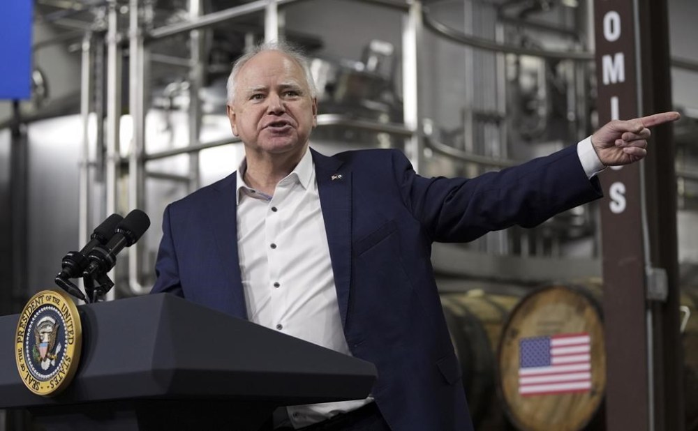 FILE - Gov. Tim Walz, D-Minn., speaks before President Joe Biden at the Earth Rider Brewery, Jan. 25, 2024, in Superior, Wis. (AP Photo/Alex Brandon, File)