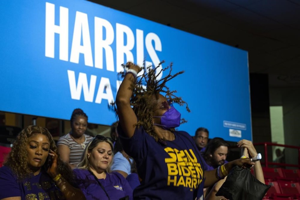 Supporters arrive before Democratic presidential nominee Vice President Kamala Harris speaks at a campaign rally with her running mate Tuesday, Aug. 6, 2024, at the Liacouras Center in Philadelphia. (AP Photo/Joe Lamberti)