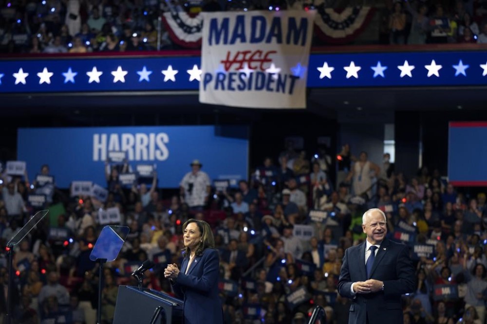 Democratic presidential nominee Vice President Kamala Harris and her running mate Minnesota Gov. Tim Walz appear at a campaign rally in Philadelphia, Tuesday, Aug. 6, 2024. (AP Photo/Joe Lamberti)