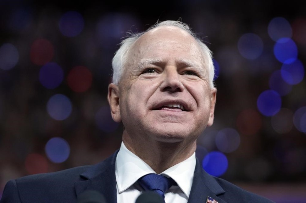 Democratic vice presidential nominee Minnesota Gov. Tim Walz appears with Democratic presidential nominee Vice President Kamala Harris at a campaign rally in Philadelphia, Tuesday, Aug. 6, 2024. (AP Photo/Matt Rourke)