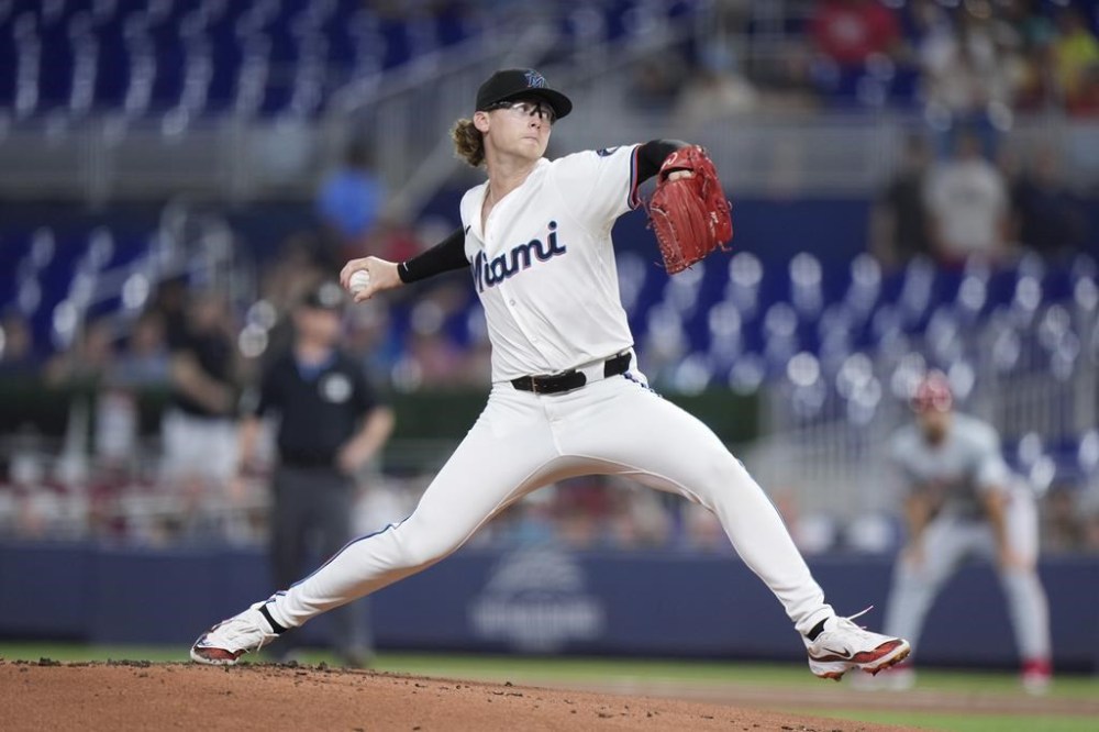 Miami Marlins' Max Meyer delivers a pitch during the first inning of a baseball game against the Cincinnati Reds, Tuesday, Aug. 6, 2024, in Miami. (AP Photo/Wilfredo Lee)