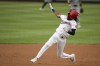 Washington Nationals' James Wood runs towards third with a triple during the second inning of a baseball game against the San Francisco Giants, Tuesday, Aug. 6, 2024, in Washington. (AP Photo/Nick Wass)