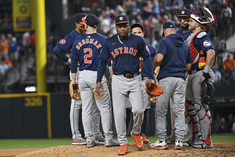 Houston Astros Framber Valdez is pulled in the ninth inning of a baseball game against the Texas Rangers, Tuesday, Aug 6, 2024, in Arlington, Texas. (AP Photo/Albert Pena)