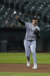 Chicago White Sox third baseman Miguel Vargas throws to first for the out on Oakland Athletics' Max Schuemann during the seventh inning of a baseball game,Tuesday, Aug. 6, 2024, in Oakland, Calif. (AP Photo/Godofredo A. Vásquez)