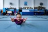 A young gymnast trains at Bonifacio Cardoso gymnasium, where Olympic medallist Rebeca Andrade trained as a child in her hometown of Guarulhos, Sao Paulo, Brazil, Tuesday, Aug. 6, 2024. (AP Photo/Tuane Fernandes)
