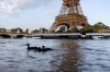 Ducks swim along the Seine River in front of the Eiffel Tower during the 2024 Summer Olympics, Monday, July 29, 2024, in Paris. As the Olympics continue in Paris, the Seine River's water quality remains a major area of concern for officials. Canadian Emma Finlin is scheduled to compete in the women's marathon swimming event in the morning as concerns swirl over the Seine River's water quality. THE CANADIAN PRESS/AP-David Goldman