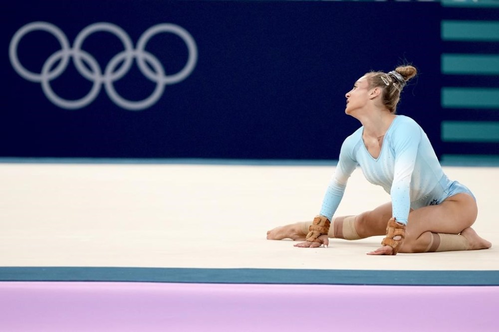 Sabrina Maneca-Voinea, of Romania, competes during the women's artistic gymnastics individual floor finals at Bercy Arena at the 2024 Summer Olympics, Monday, Aug. 5, 2024, in Paris, France. (AP Photo/Francisco Seco)