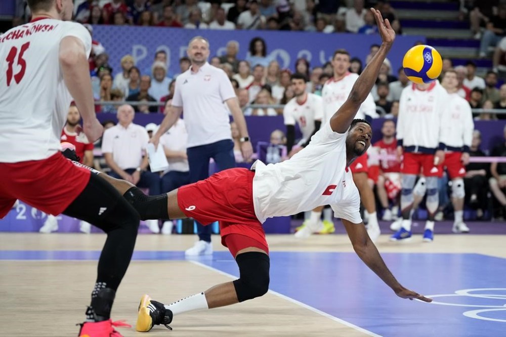 Wilfredo Leon Venero, of Poland, chases after a ball during a semifinal men's volleyball match against the United States at the 2024 Summer Olympics, Wednesday, Aug. 7, 2024, in Paris, France. (AP Photo/Alessandra Tarantino)