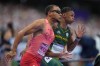 Andre De Grasse, of Canada, left, competes in the men’s 200-metre semifinals at the 2024 Summer Olympics, Wednesday, Aug. 7, 2024, in Saint-Denis, France. Andre De Grasse will not be defending his Olympic title in the men's 200-metre final. The 29-year-old from Markham, Ont., finished third in his semifinal at 20.41 seconds Wednesday at Stade de France. THE CANADIAN PRESS/Christinne Muschi