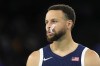 United States' Stephen Curry stands on the court during a men's basketball game against Brazil at the 2024 Summer Olympics, Tuesday, Aug. 6, 2024, in Paris, France. (AP Photo/Michael Conroy)