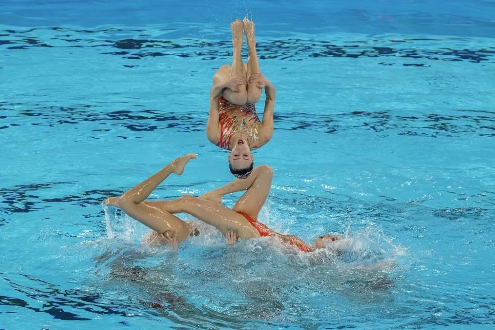 Team China competes in the team acrobatic routine of artistic swimming at the 2024 Summer Olympics, Wednesday, Aug. 7, 2024, in Saint-Denis, France. (AP Photo/Lee Jin-man)