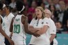United States' Cheryl Reeve talks with Promise Amukamara (10), of Nigeria, following a women's quarterfinal game at Bercy Arena at the 2024 Summer Olympics, Wednesday, Aug. 7, 2024, in Paris, France. (AP Photo/Mark J. Terrill)