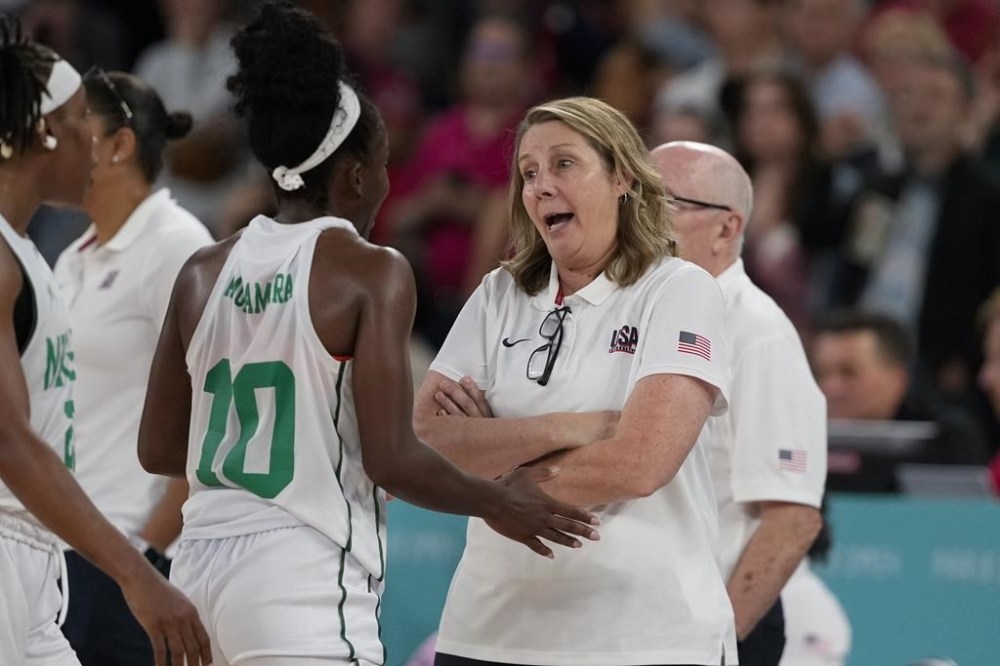 United States' Cheryl Reeve talks with Promise Amukamara (10), of Nigeria, following a women's quarterfinal game at Bercy Arena at the 2024 Summer Olympics, Wednesday, Aug. 7, 2024, in Paris, France. (AP Photo/Mark J. Terrill)