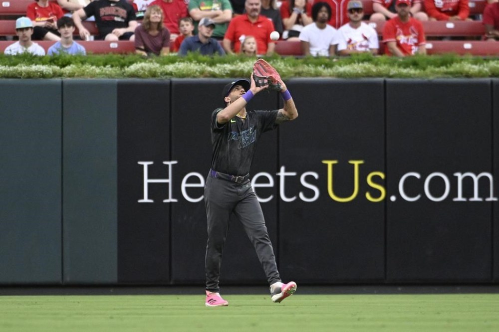 Tampa Bay Rays center fielder Jose Siri catches a fly ball hit by St. Louis Cardinals' Brendan Donovan in the first inning of a baseball game, Wednesday, Aug. 7, 2023, in St. Louis. (AP Photo/Joe Puetz)