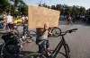 JOHN WOODS / FREE PRESS
About 180 cyclists blocked cars at the intersection of Academy and Wellington Tuesday, July 30, 2024. Cyclists want safe infrastructure after a child was hit by a driver at the intersection yesterday.

Reporter: ?