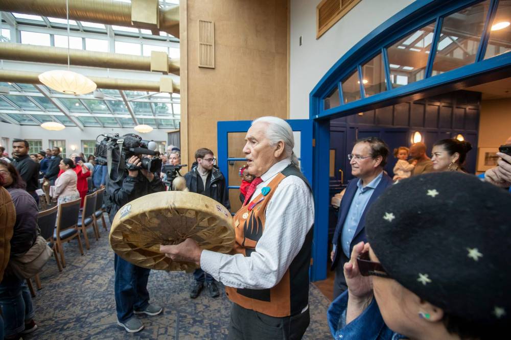 BROOK JONES / FREE PRESS
Elder Winston Wuttunee leads in a group dignitaries prior to the start of the citizenship ceremony.