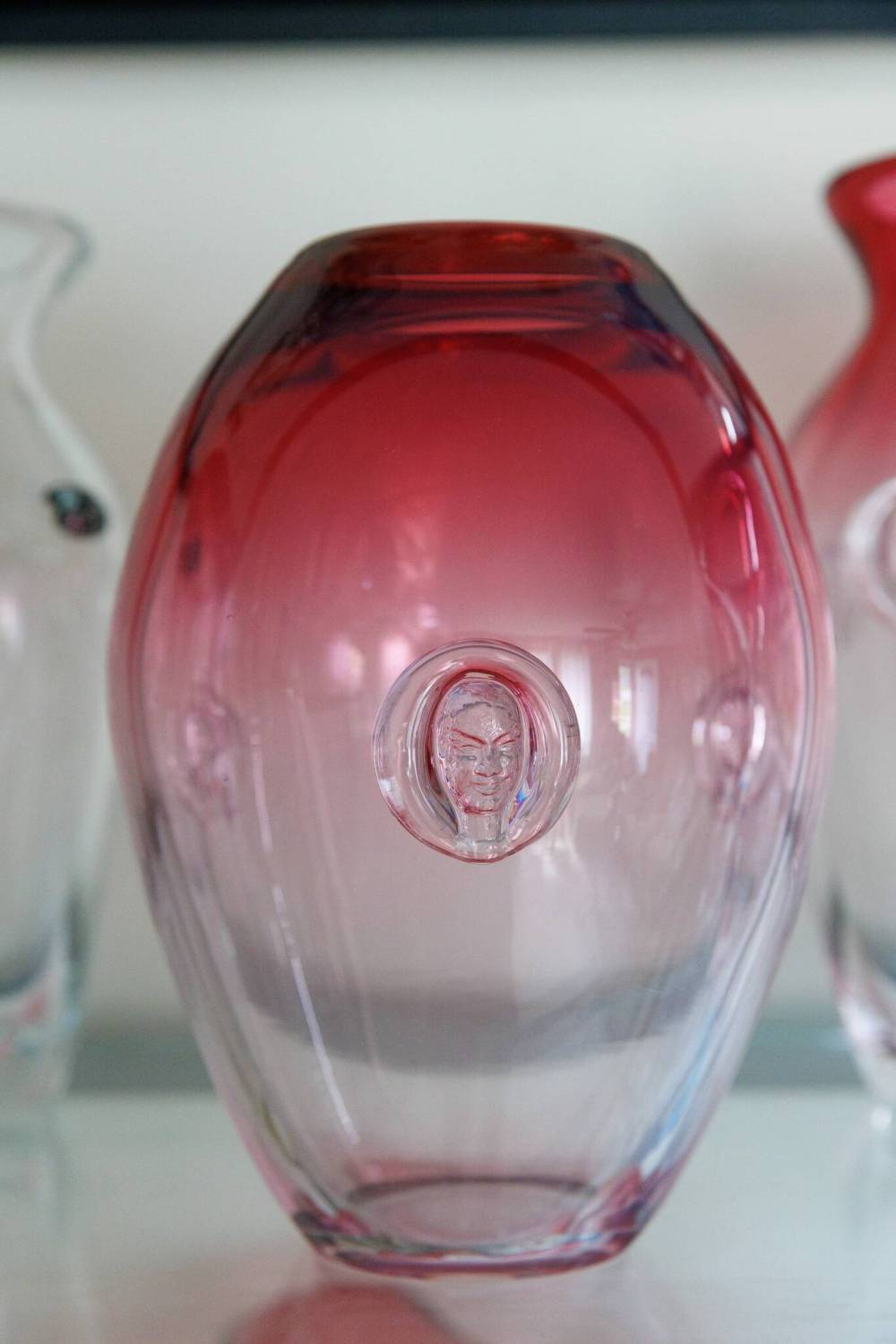 MIKE DEAL / FREE PRESS
A vase featuring several faces is part of the Chalet Artistic Glass collection Ken Huss has built up.