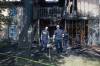 Ruth Bonneville / Free Press Files
                                Forensic officers investigate at the scene of a fire in a townhouse on Keewatin Street last Wednesday.