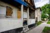 NIC ADAM / FREE PRESS FILES
                                Four houses sit vacant on Powers Avenue. The William Whyte Neighbourhood Association issued a public plea for help, noting the presence of at least 42 burned buildings in the area.
