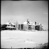 Cross Lake residential school outbuildings and church in 1947. (La Société historique de Saint-Boniface)