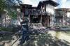 RUTH BONNEVILLE / FREE PRESS FILES
                                Forensic officers investigate the fire scene at the townhouse on Keewatin Street on June 26.
