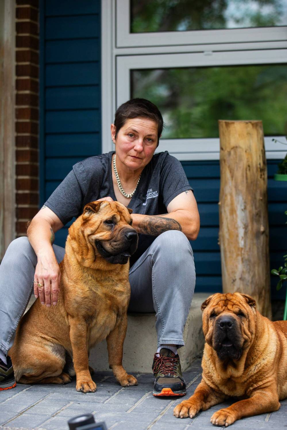 MIKAELA MACKENZIE / FREE PRESS
                                “I fear that for some truck drivers, especially the older guys — they’ve got this little old dog and everything — and now they’ve got to navigate all this,” Devi Gershbain said at her St. Vital home, with Ever and Radar at her feet.