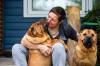 MIKAELA MACKENZIE / FREE PRESS
                                Long haul trucker and dog shower Devi Gershbain and her dogs, Ever and Radar, at home in Winnipeg on Wednesday, July 3, 2024. The CDC is changing the rules on bringing dogs across the Canada/U.S. border, which will impact the trucking, show dog and breeder communities. For Jura story.