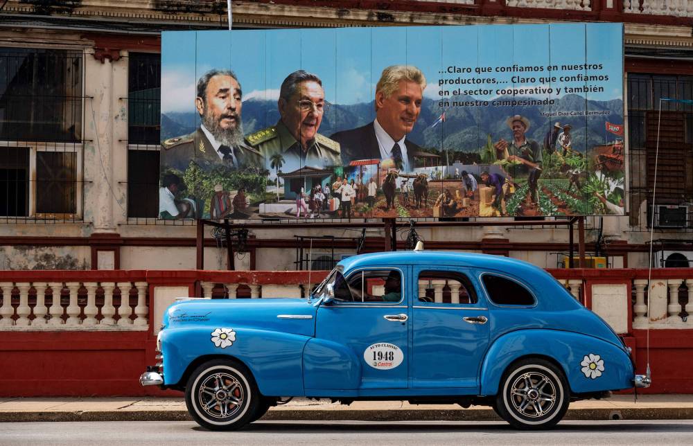 Yamil Lage / AFP / Getty Images / TNS
Old-model cars are a regular sight in Cuba, but columnist Peter McKenna writes some Cubans have been able to obtain newer models, purchased by family in the U.S.
