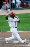 JOHN WOODS / FREE PRESS
                                Goldeyes batter Miles Simington watches his hit Tuesday against the Kansas City Monarchs.