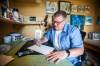 MIKAELA MACKENZIE / FREE PRESS 
                                Artist (and art teacher by day) Tim Toews sketches in his backyard studio.