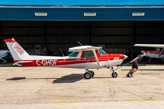 Harv's Air dispatcher and commercial pilot student Kevin Hladik taxis a small Cessna plane at St. Andrews Airport on Monday morning. Harv's Air is one of 75 companies that use the airport. (Nic Adam / Free Press)