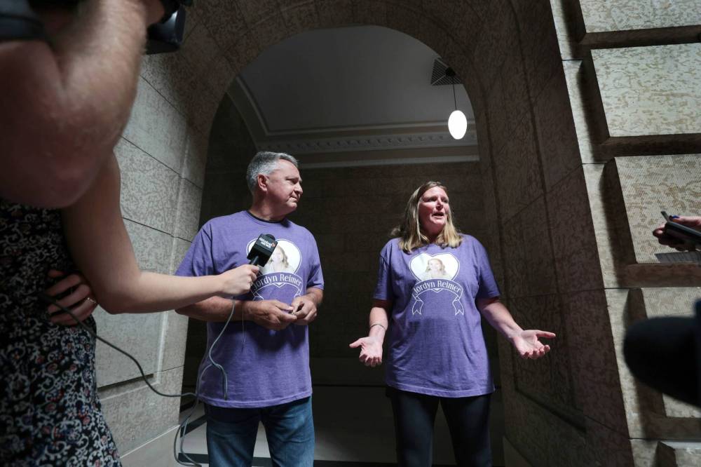 Ruth Bonneville / Free Press
The Reimers, wearing Justice for Jordyn T-shirts, said laws already exist to punish those who aid and abet a crime.