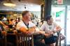 MIKAELA MACKENZIE / FREE PRESS Soccer fans Scott Kelman (left) and Patrick Jackson watch the match between England and the Netherlands at The Grove.