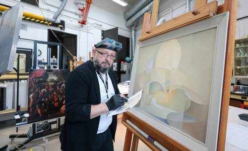 Ruth Bonneville / Free Press ent - Behind the Scenes - Vitaliy Yatsevych Photo of Vitaliy Yatsevych, WAG-Qaumajuq Conservator, at the Winnipeg Art Gallery. Vitaliy Yatsevych is WAG-Qaumajuq Conservator. His job is to care for and restore artworks to their former glory. He recently embarked on one of the biggest restoration projects of his career: Kim Adams Earth Wagons, which is composed of teeny tiny model train parts. For feature on him and his work as part of a new Arts & Life series called Behind the Scenes, Photos of him with Earth Wagons still on display and working behind the scenes on works. Story by Jen Zoratti July 10th, 2024
                                Ruth Bonneville / Free Press
                                WAG-Qaumajuq conservator Vitaliy Yatsevych maintains the gallery&rsquo;s displays, preserving the artwork for future generations.