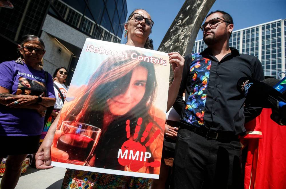 JOHN WOODS / THE CANADIAN PRESS
Krystal Fox and Jeremy Contois, brother of Rebecca Contois, react with joy outside the Manitoba Law Courts after the guilty verdict of serial killer Jeremy Skibicki is read in a courtroom in Winnipeg on Thursday.