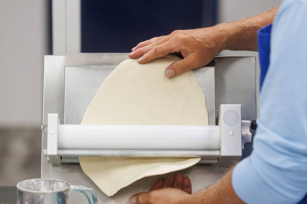 MIKE DEAL / FREE PRESS
When it comes to making perogies, two pairs of hands are better than one.