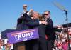 Jabin Botsford / Washington Post Files 
                                Former U.S. president Donald Trump raises his arm with blood on his face after being shot at during a rally Saturday.