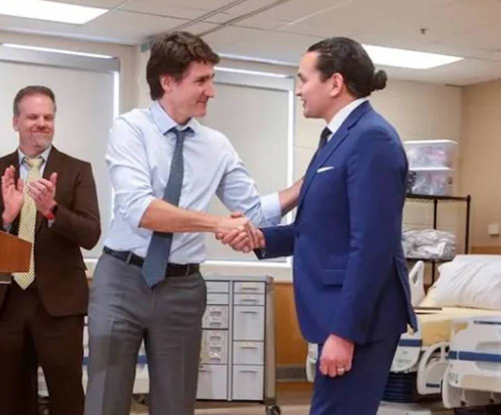 Prime Minister Justin Trudeau and Manitoba Premier Wab Kinew at an announcement for health-care funding in Manitoba in April. Kinew is urging the federal government to accelerate an increase in Canada’s defence spending.	(The Canadian Press)