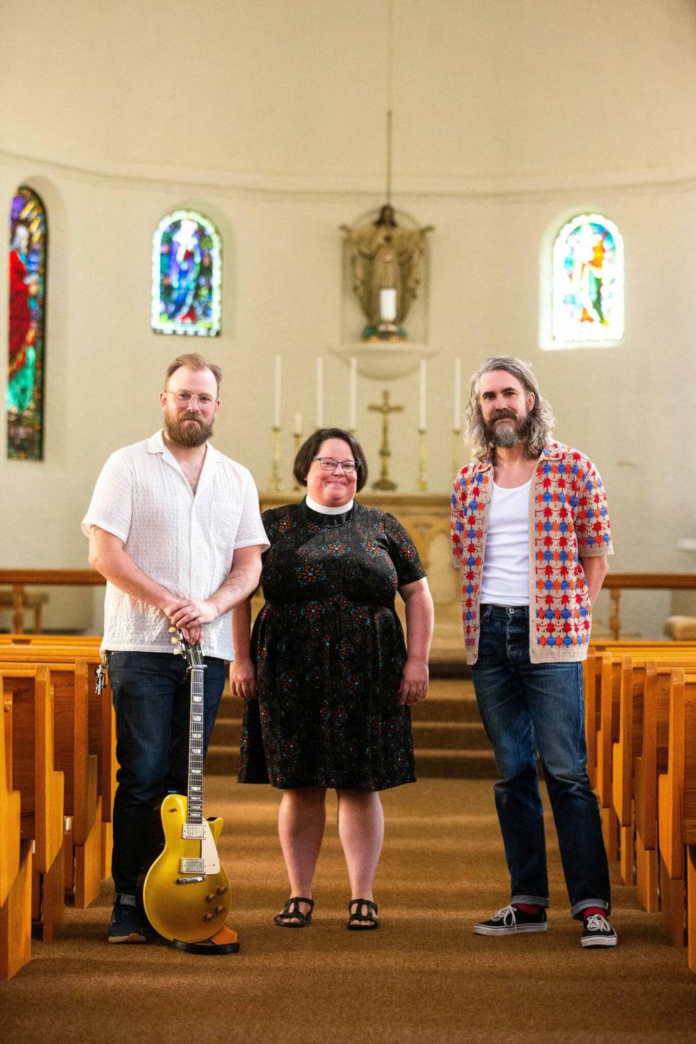 MIKAELA MACKENZIE / FREE PRESS
Joey Landreth (left), Rev. Lauren Schoeck and Dave Landreth in the sanctuary of St. Michael and All Angels’ Anglican Church. Bros Landreth music fan Mark Chipman purchased the church to give the group studio space and a home for their record label music management company.