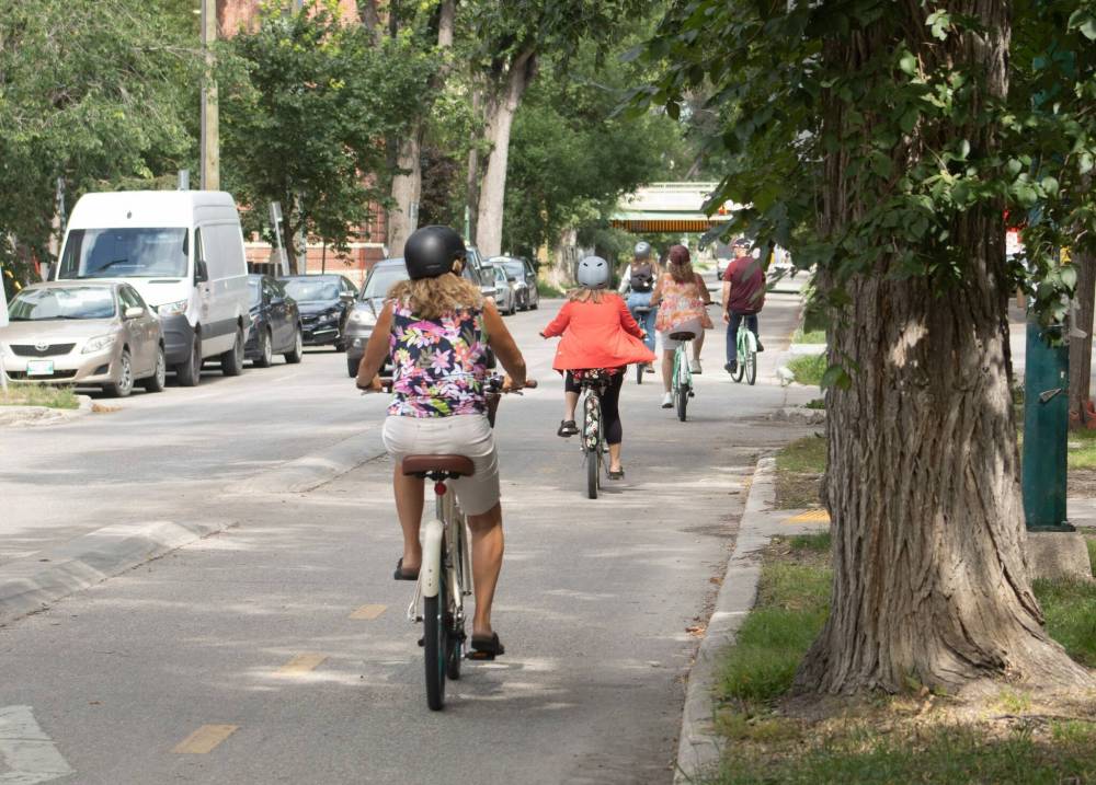 MIKE THIESSEN / FREE PRESS FILES
                                Bike Winnipeg says bike traffic increased by more than 200 per cent within four years after the protected lane on Assiniboine Avenue was built in 2010.