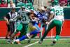 Winnipeg Blue Bombers running back Chris Smith runs the football against the Saskatchewan Roughriders during preseason action in May. The two teams are set meet for the first time in the regular season when they play Friday in Regina. THE CANADIAN PRESS FILES/Heywood Yu