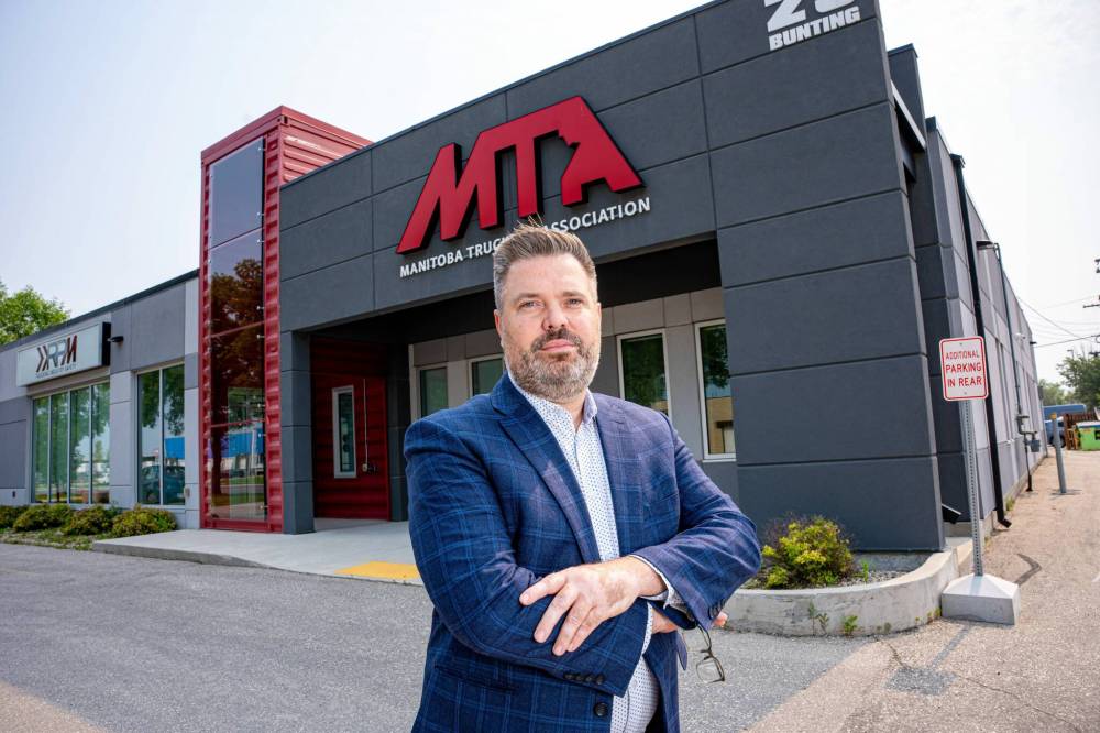 NIC ADAM / FREE PRESS Aaron Dolyniuk, executive director of the Manitoba Trucking Association or MTA, pictured outside the MTAs building Friday morning. The MTA is speaking out against “Driver Inc.,” a trucking industry scheme where companies misclassify employees to avoid paying taxes and other labour deductions.