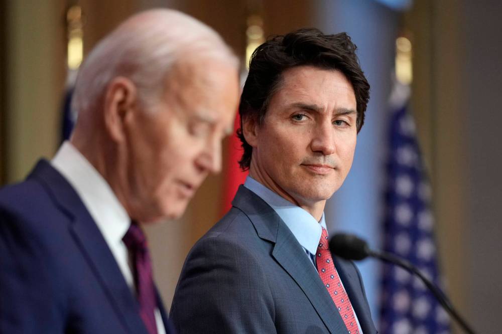 There is speculation Justin Trudeau could follow U.S. President Joe Biden and step down as prime minister. However, not only are Trudeau and Biden are two different political animals, their political situations are objectively different, writes columnist Dan Lett. (Andrew Harnik / The Associated Press files)