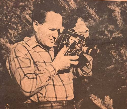University of Manitoba Archives
                                Cotter with his camera