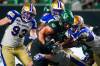 HEYWOOD YU / THE CANADIAN PRESS FILES
                                The Blue Bombers defence wraps up Roughriders running back AJ Ouellette on Friday night in July.